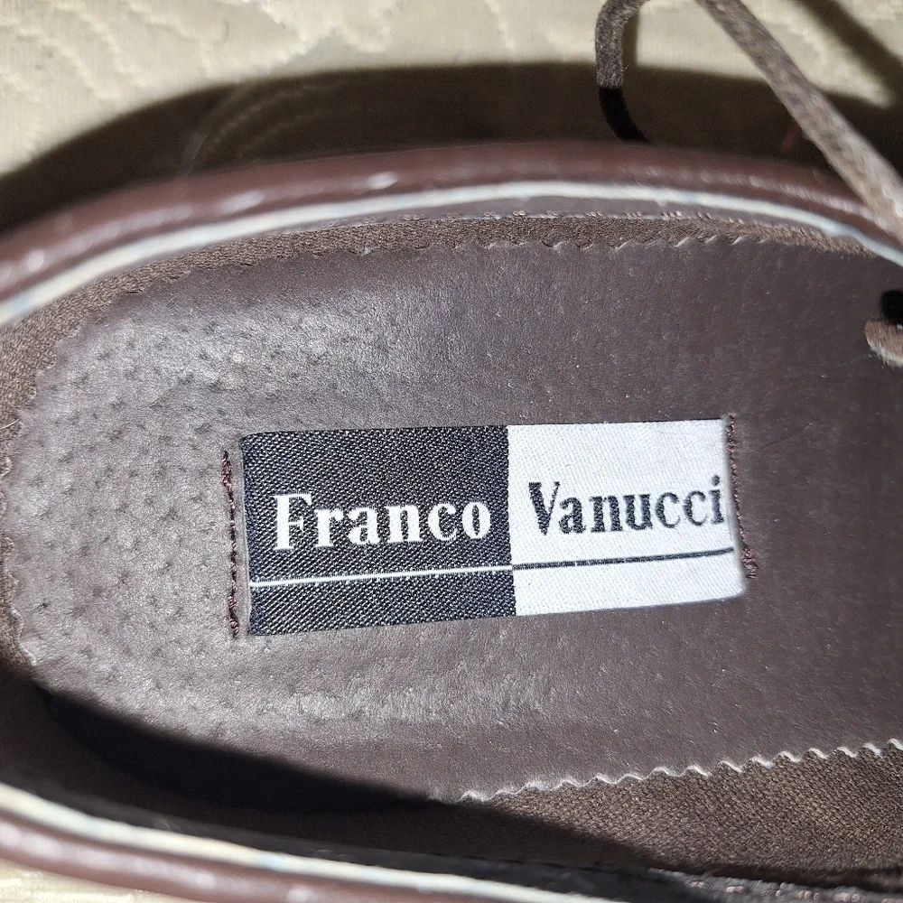 A pair of Franco Vanucci brown suede men's loafers in a size 10.5. EUC.